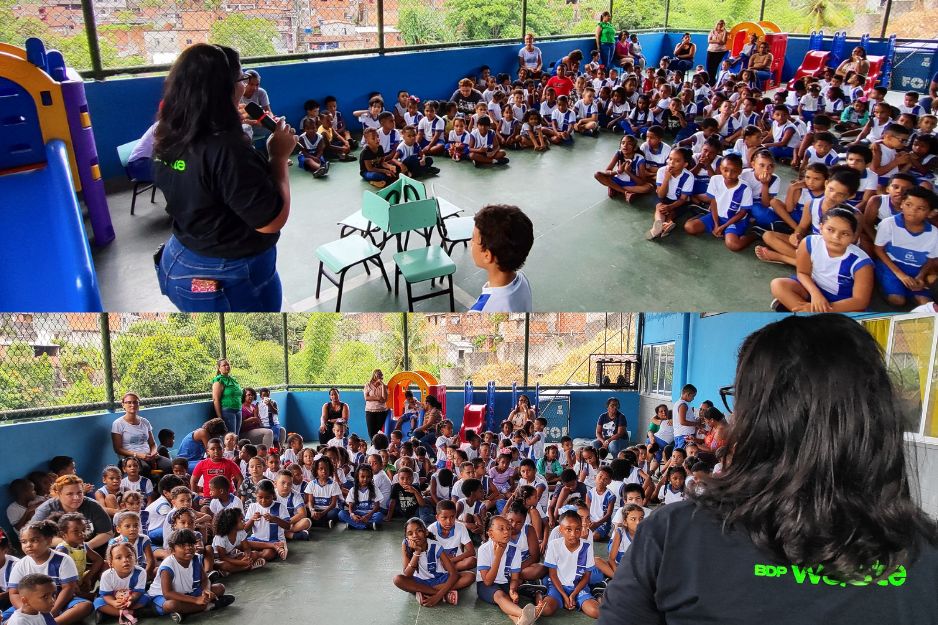 Colaborar da BDP Waste interage com os alunos do CMEI João Paulo I na ação Natal Solidário